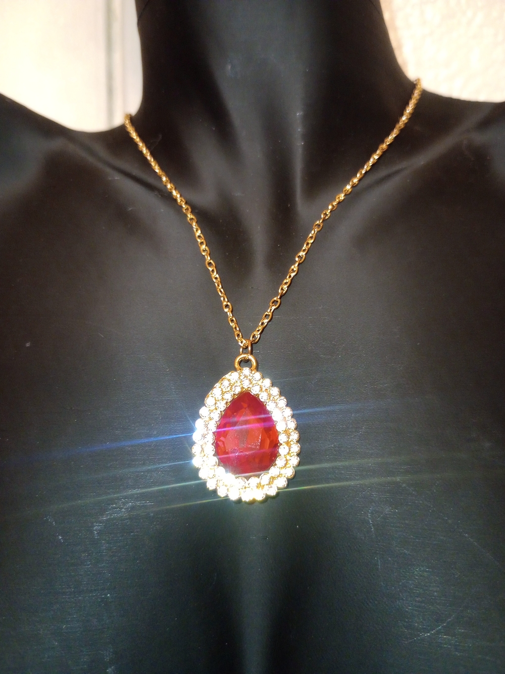 Gold-Tone Teardrop Necklace with Red Crystal Pendant